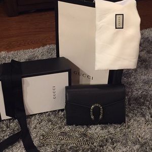 Brand new Gucci clutch with chain